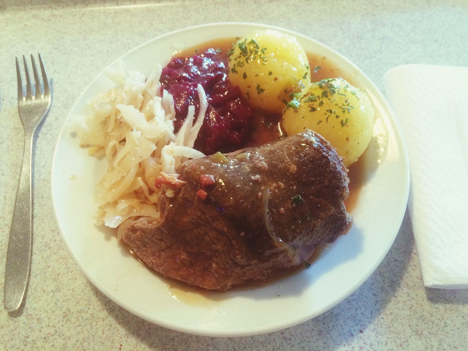 Bavarian Schweinshaxe with Sauerkraut and Potato Dumplings