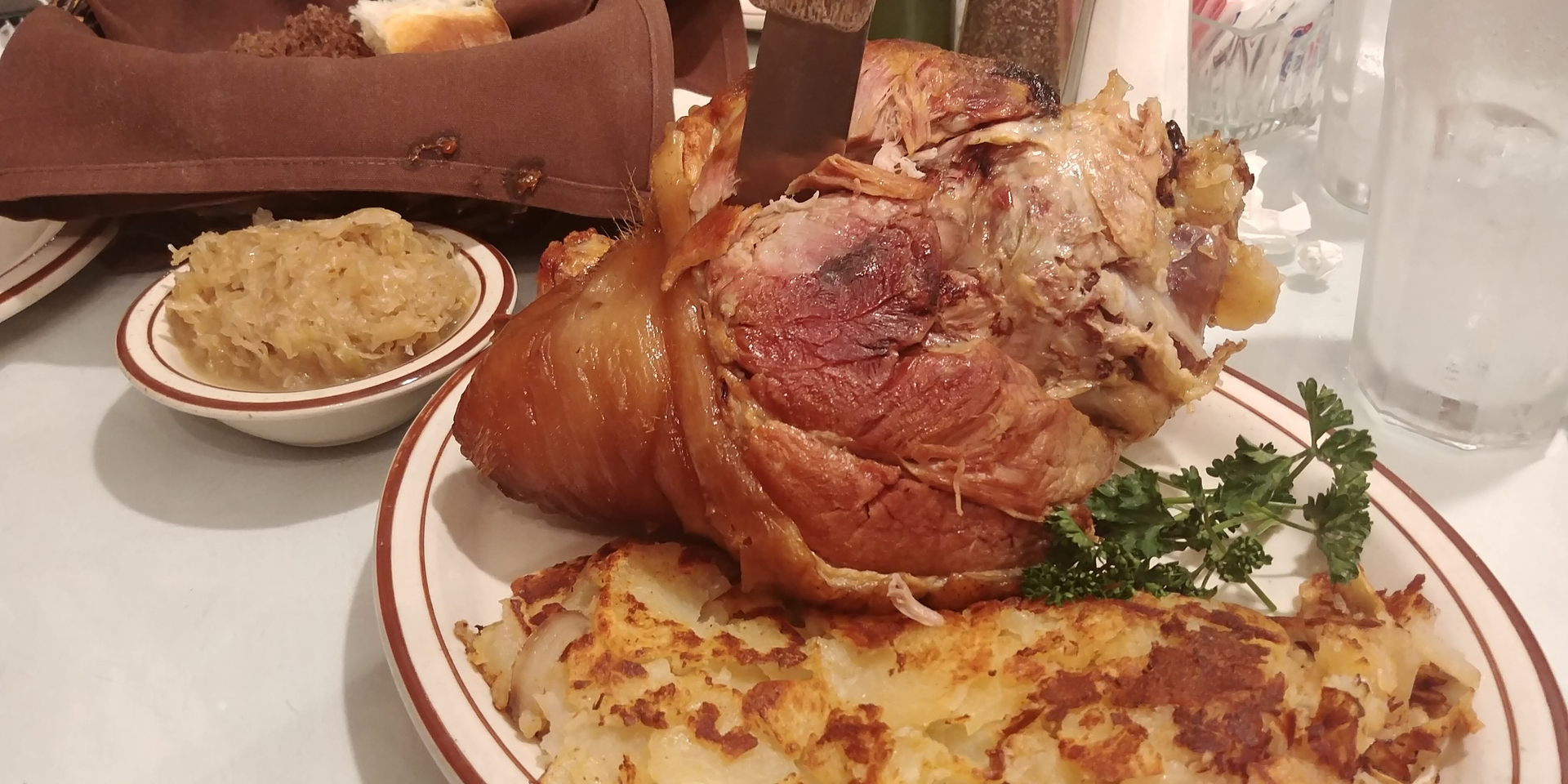 Bavarian Schweinshaxe with Sauerkraut and Potato Dumplings