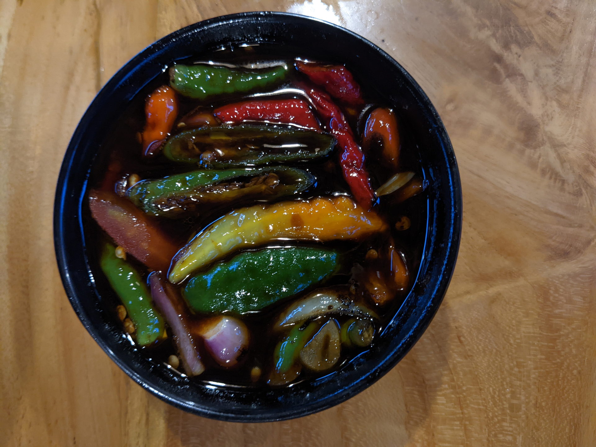 Burmese Tamarind-Glazed Eggplant with Green Onion Garnish