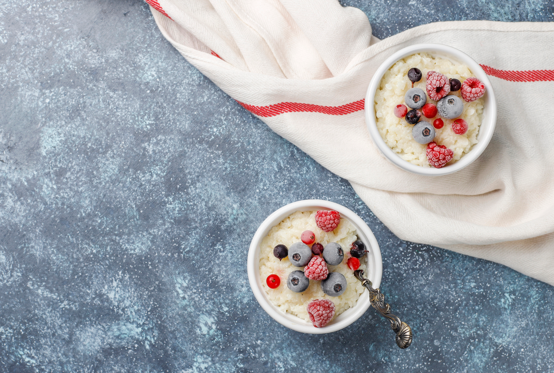 Creamy Madagascar Vanilla Bean Rice Pudding with Fresh Berries