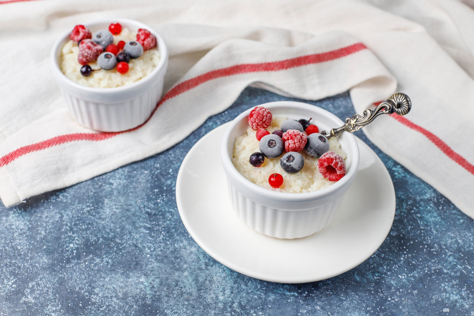 Creamy Madagascar Vanilla Bean Rice Pudding with Fresh Berries