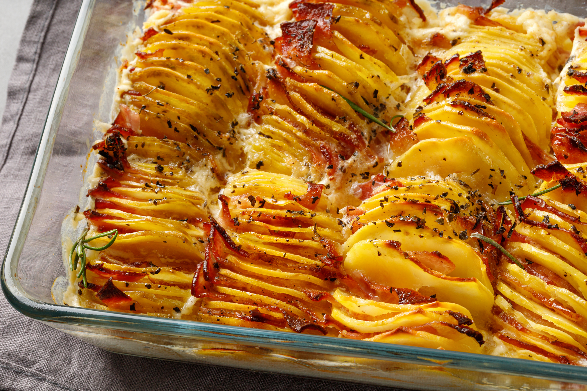 Creamy Swedish Hasselback Potato Gratin with Gruyere and Caramelized Shallots