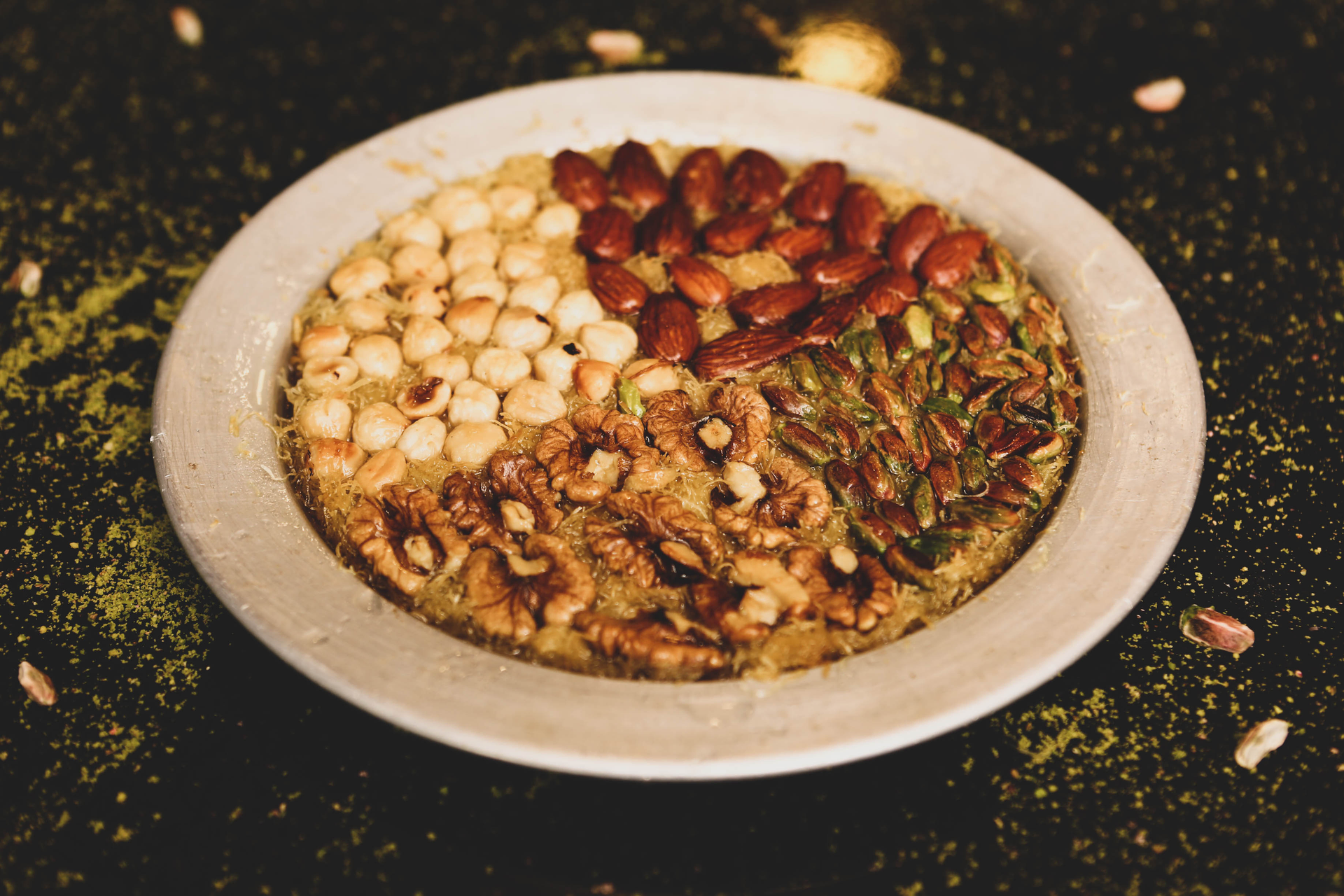 Crispy Palestinian Maqluba with Spiced Lamb and Pine Nut Garnish