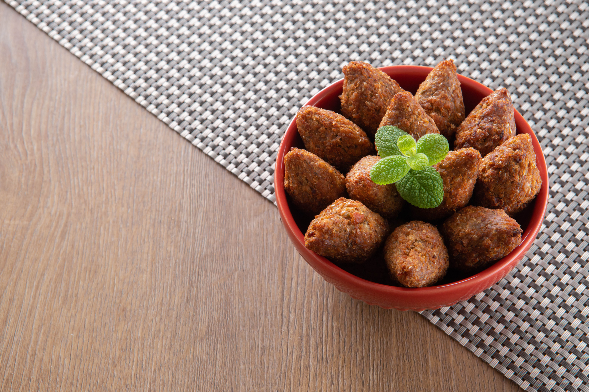 Crunchy Lebanese Kibbeh Balls Stuffed with Pine Nuts and Lamb