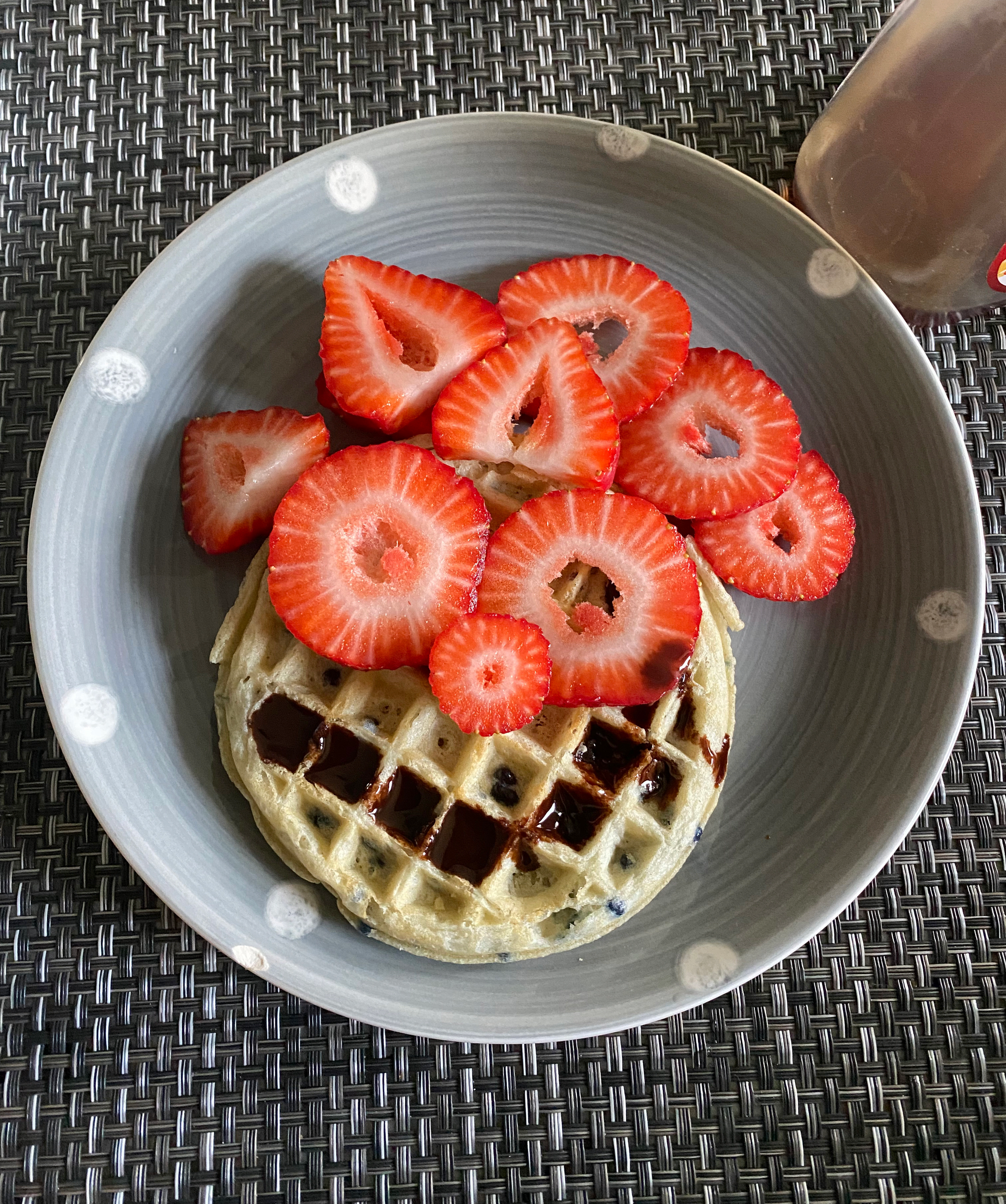 Decadent Belgian Waffle with Chocolate Sauce and Strawberries
