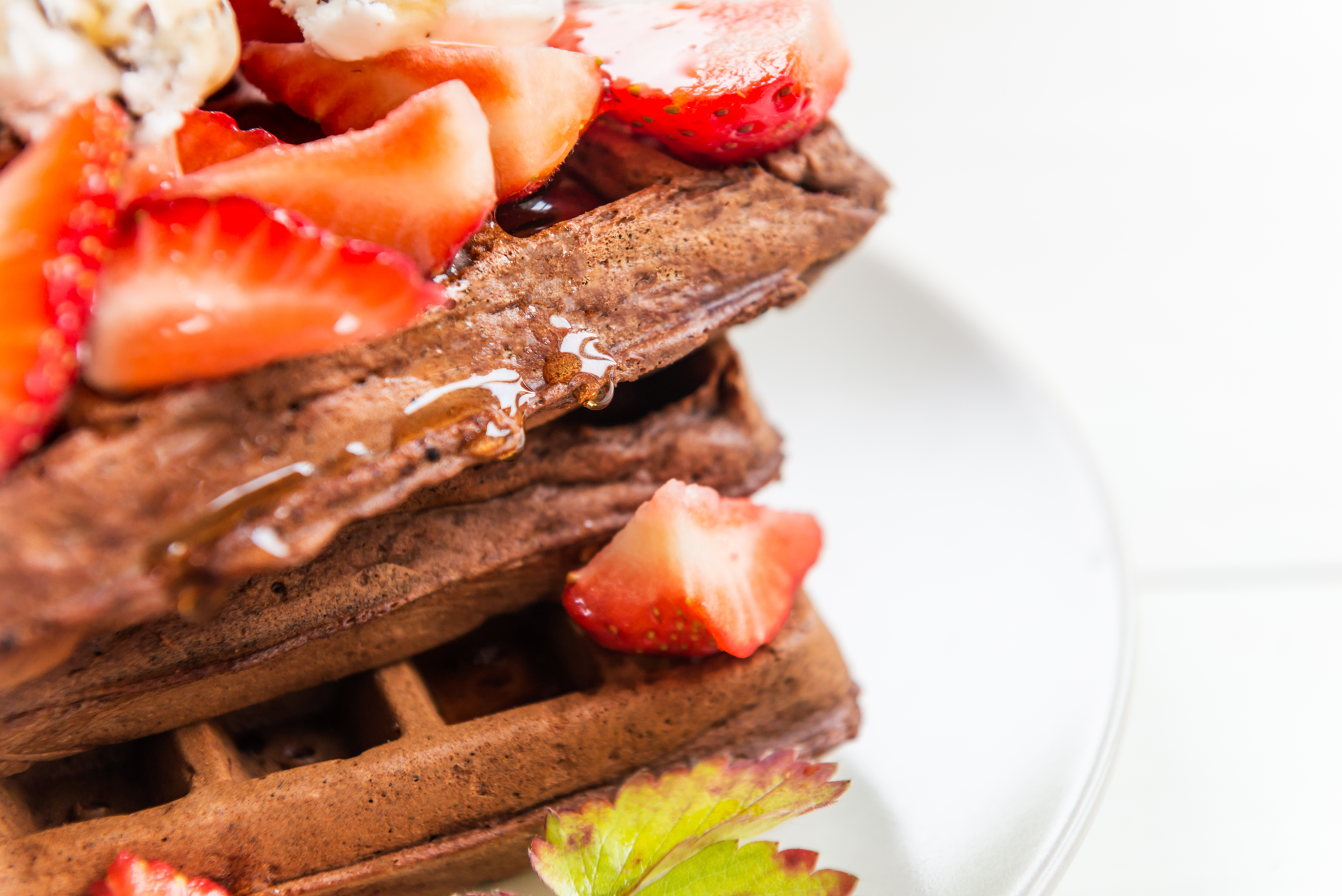 Decadent Belgian Waffle with Chocolate Sauce and Strawberries