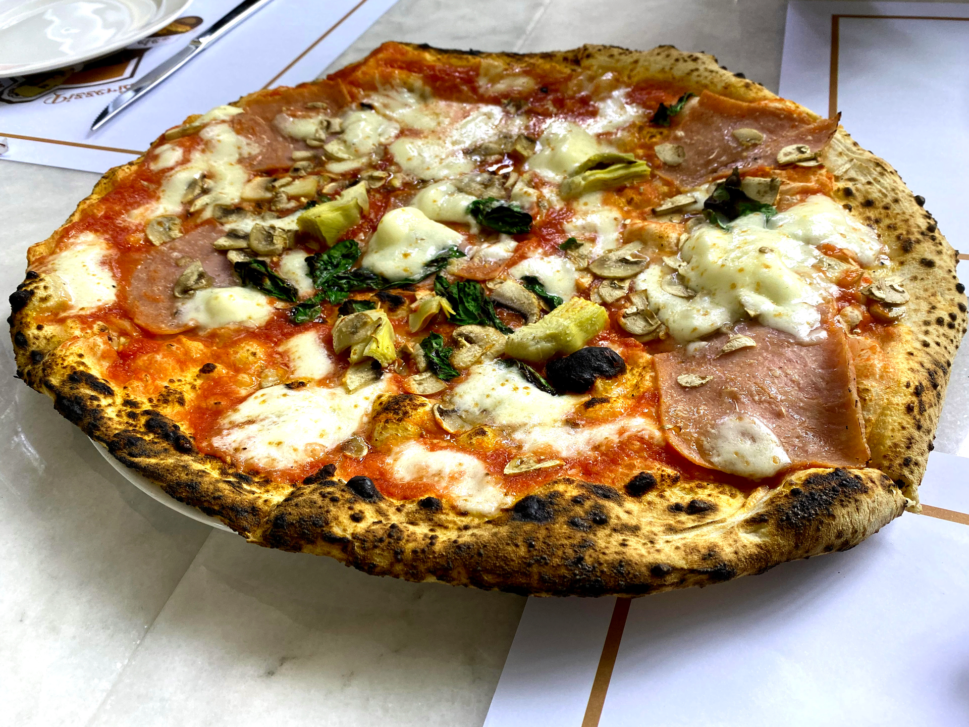 Flavorful Argentine Matambre a la Pizza with Mozzarella and Basil