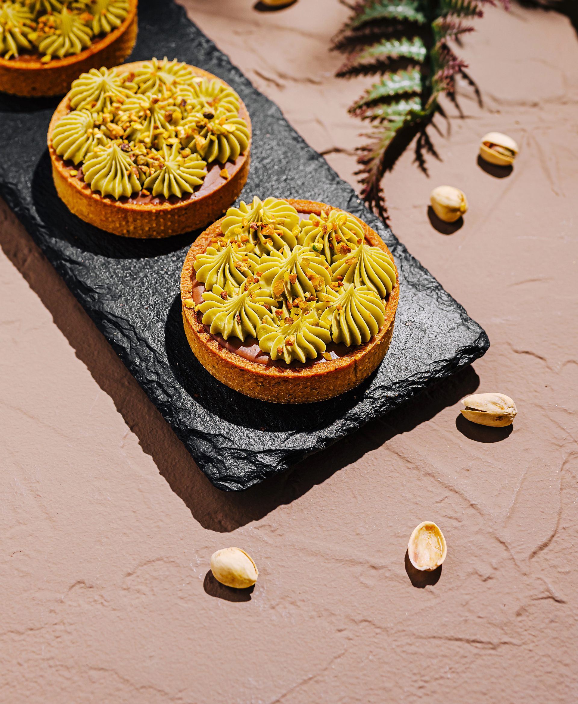 Fruity Moroccan Date and Orange Blossom Tarts with Pistachio Dust