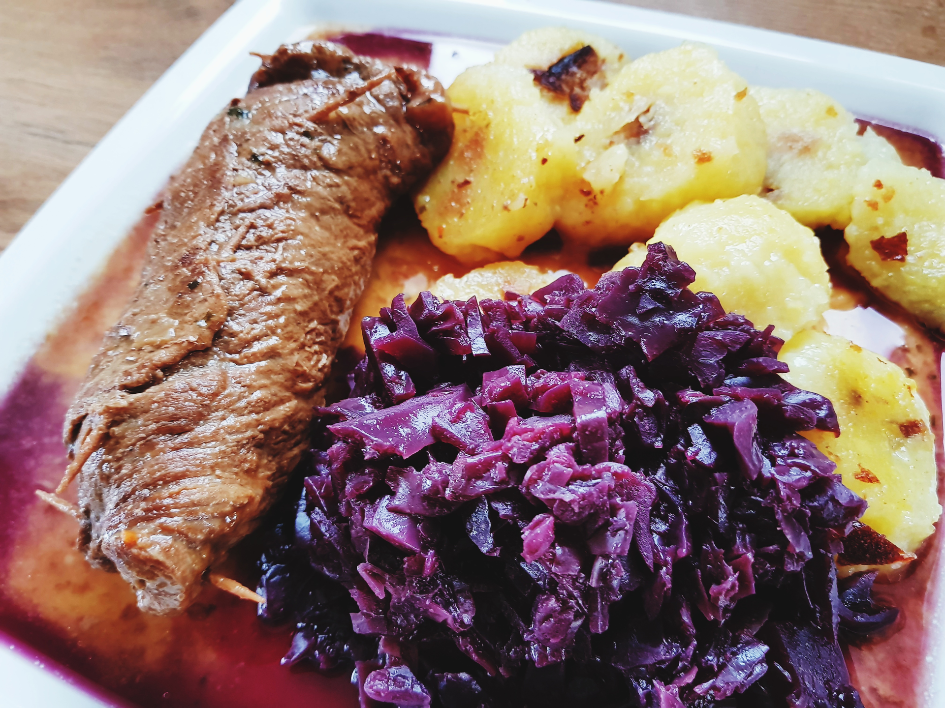 Hearty German Sauerbraten with Red Cabbage