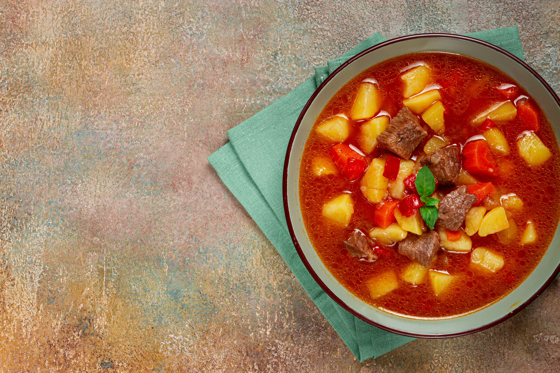 Hearty Goulash Soup with Beef and Paprika Swirl