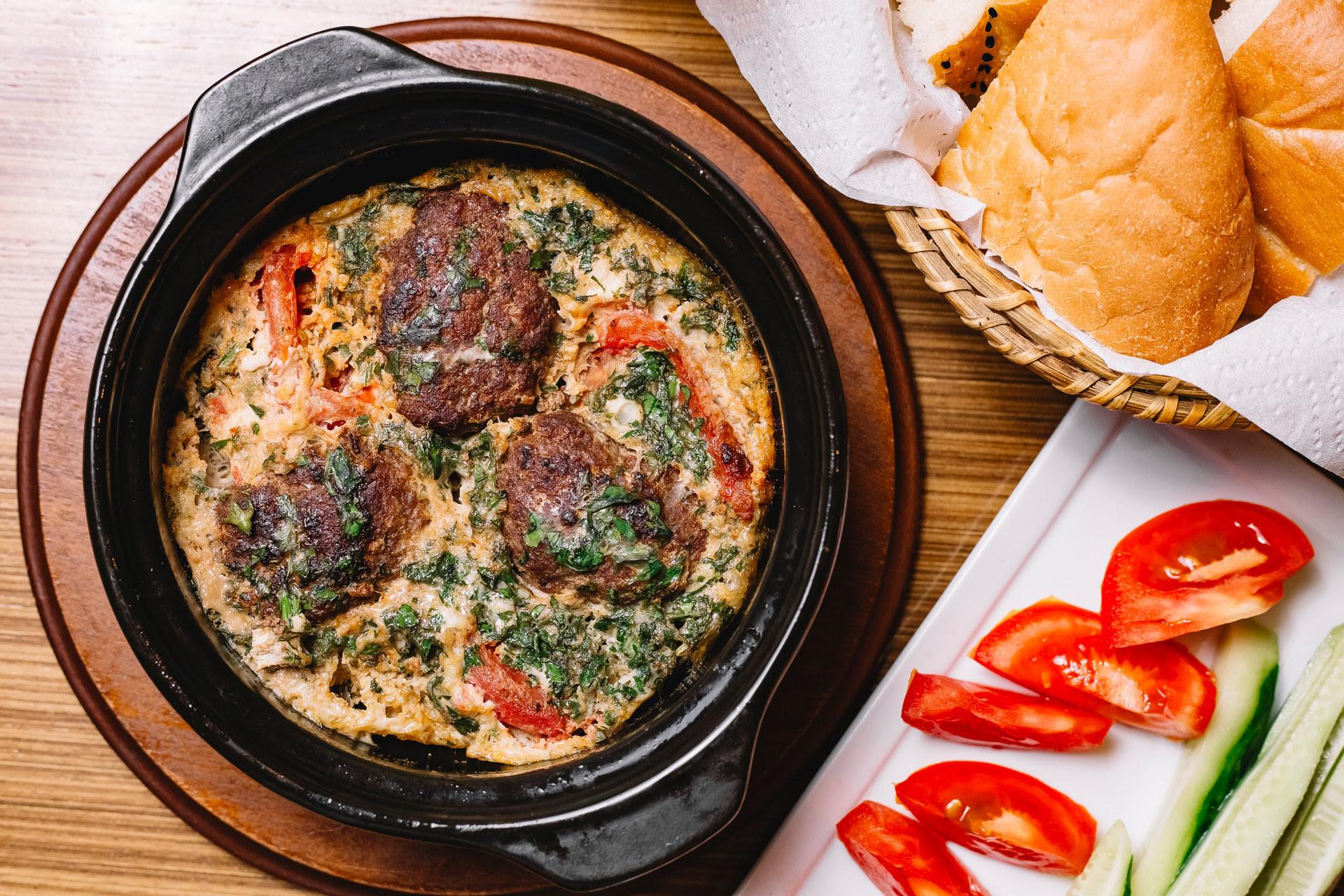 Hearty Moroccan Kefta Tagine with Tomatoes and Eggs