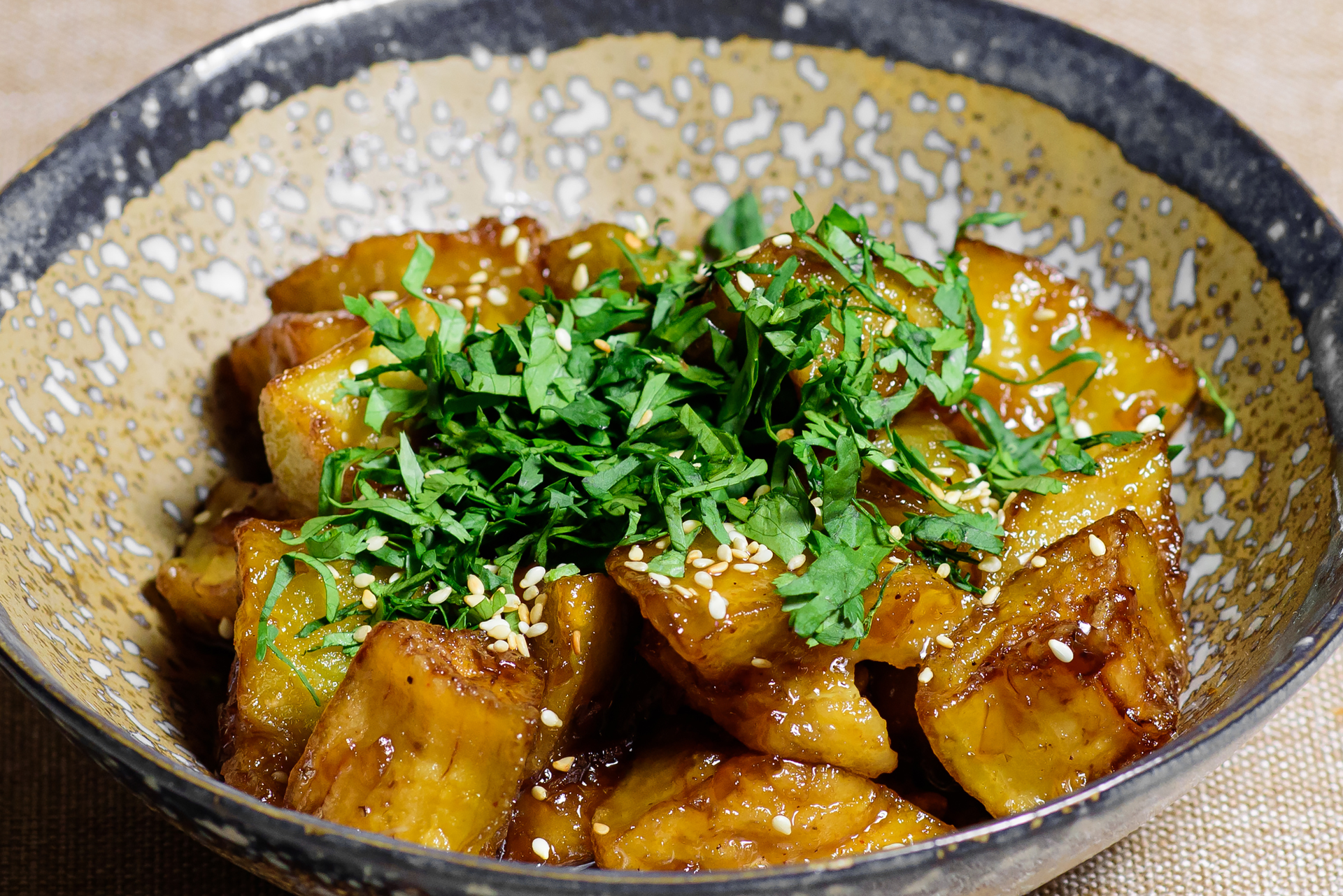 Honey-Ginger Glazed Korean Sweet Potatoes with Toasted Sesame Seeds