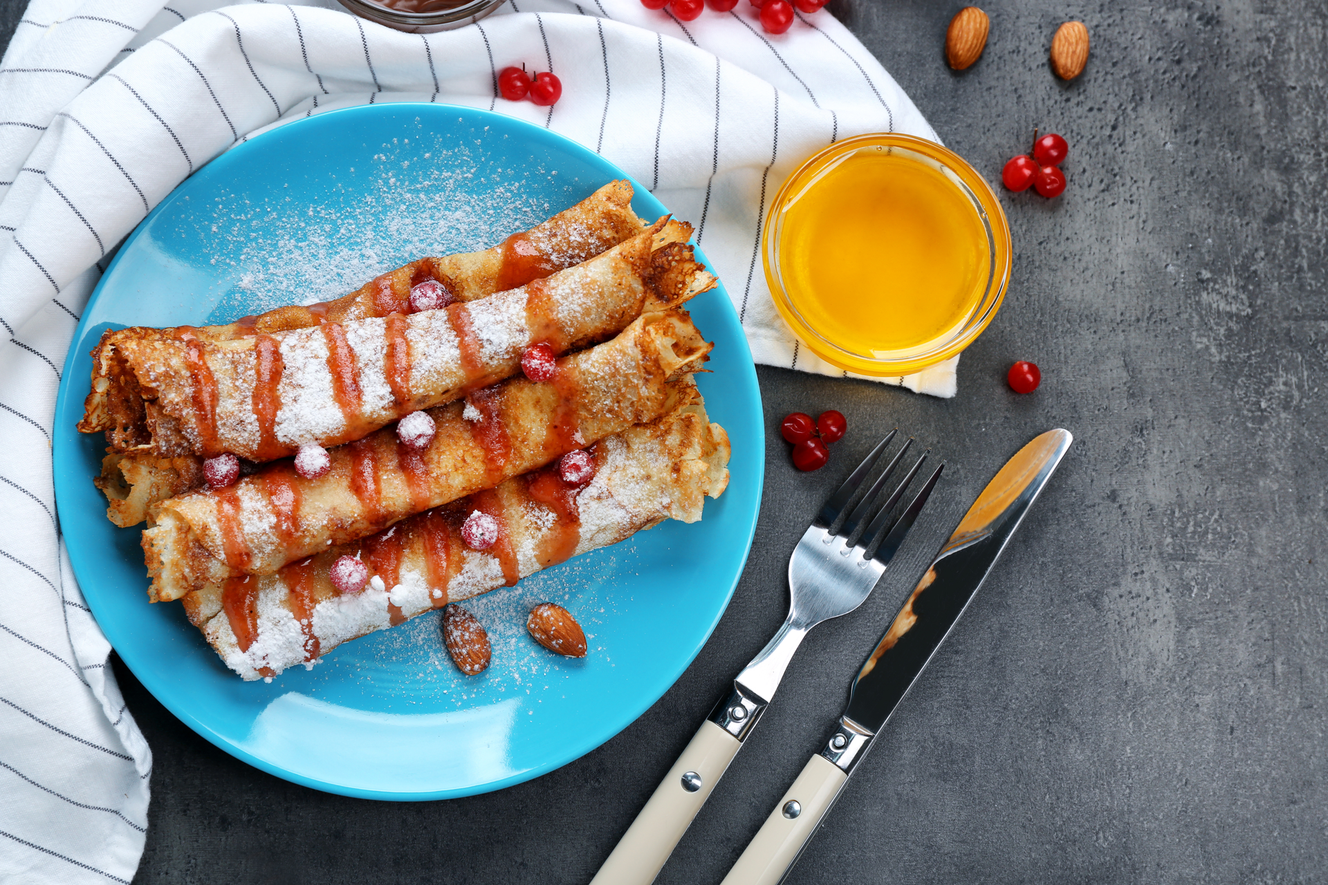 Hungarian Apricot Jam-filled Palacsinta with Powdered Sugar