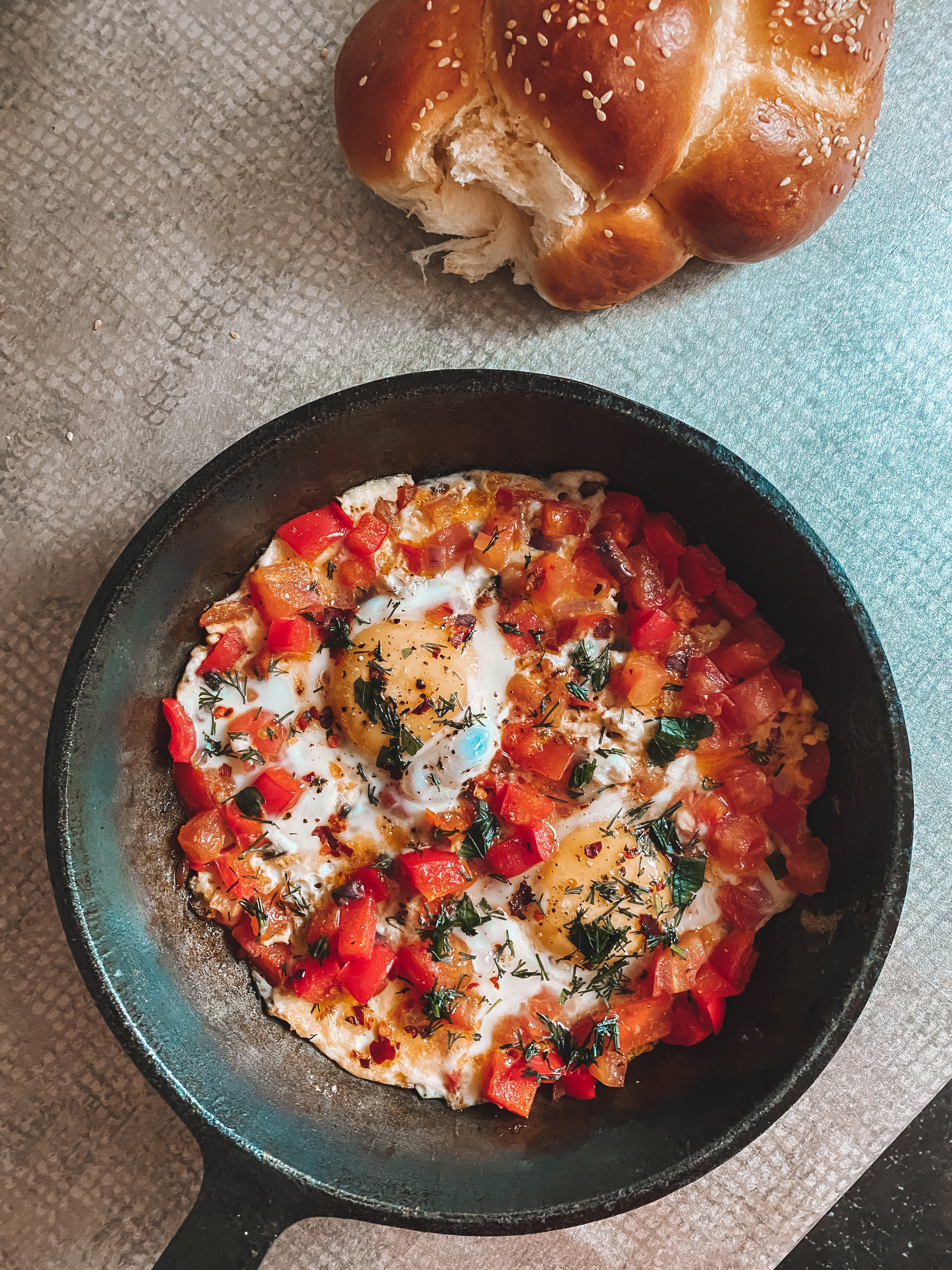 Israeli Shakshuka with Poached Eggs and Spicy Tomato Sauce