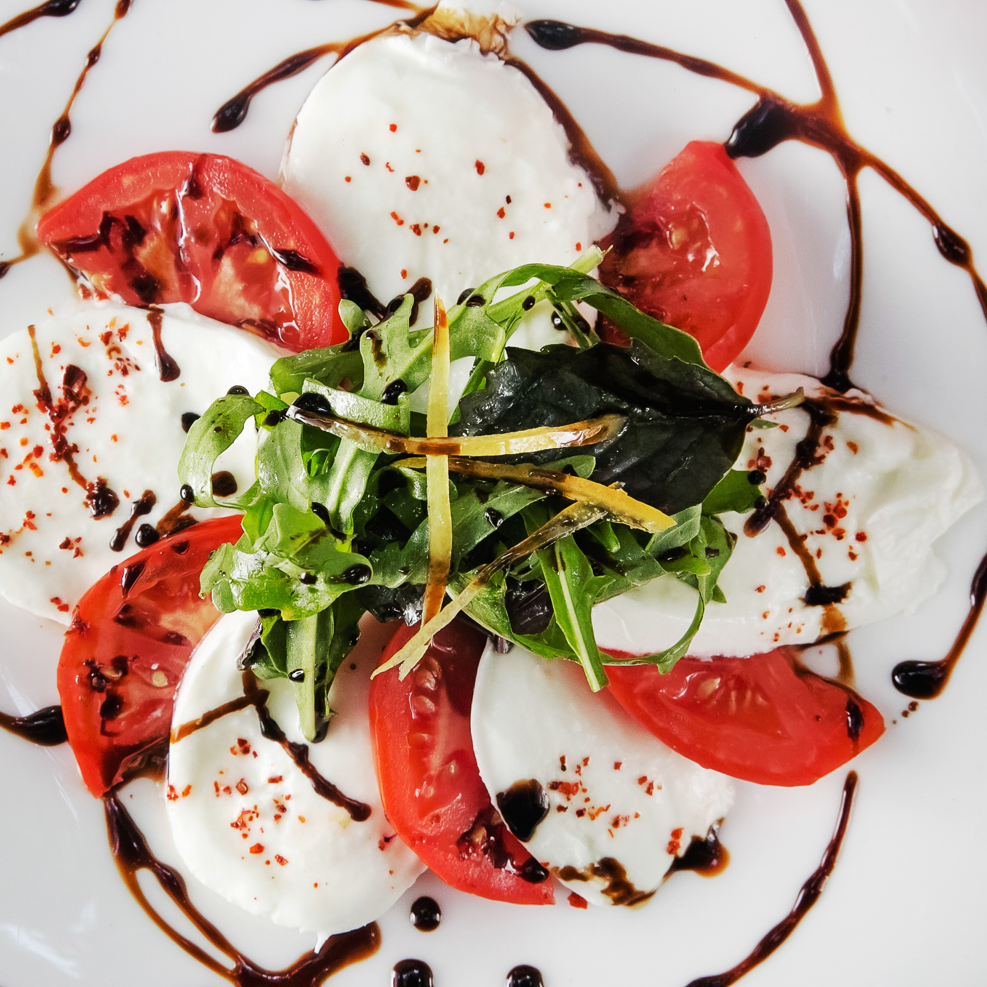 Italian Herb-Infused Burrata Salad with Balsamic Reduction