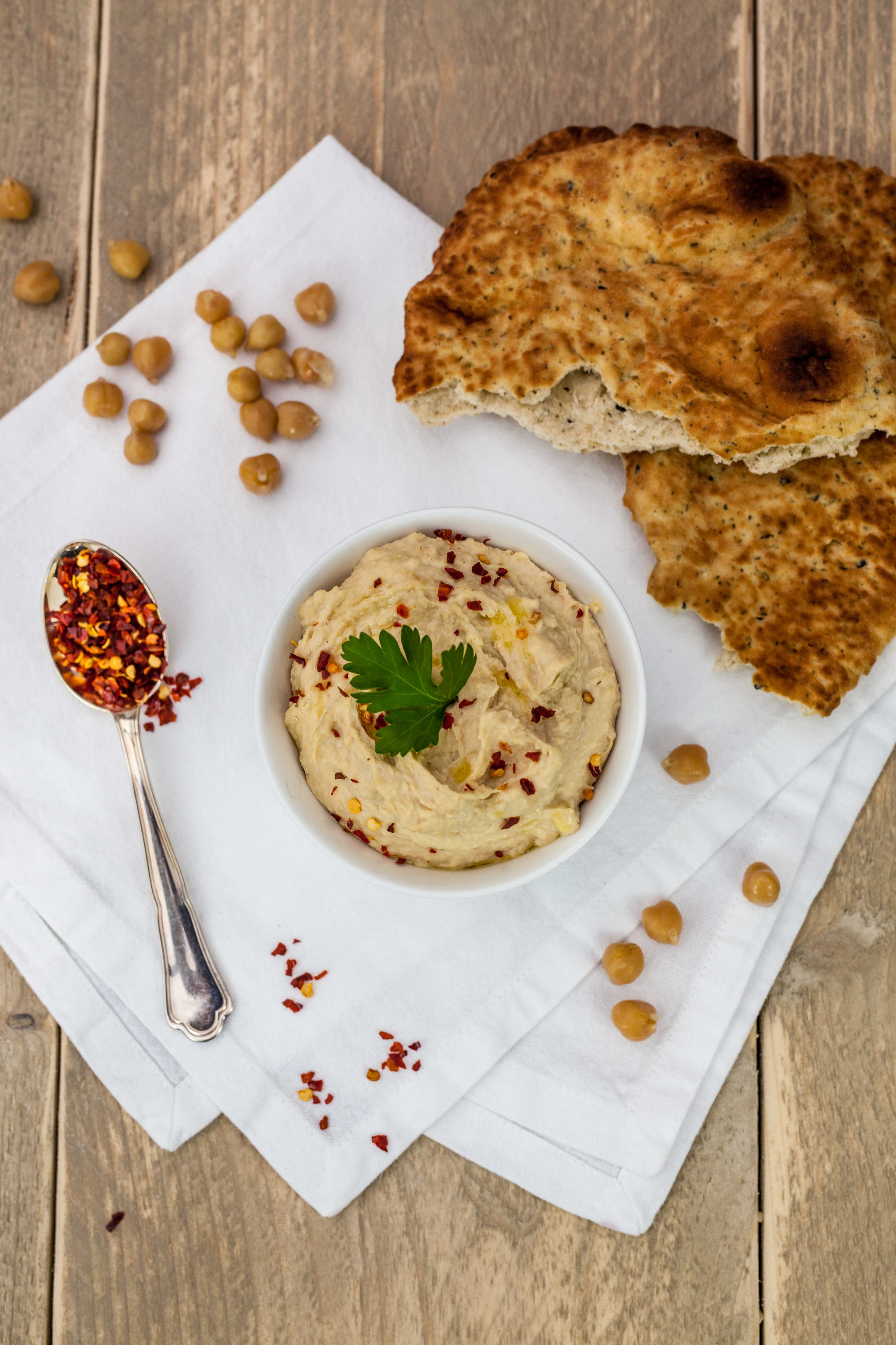 Lebanese Fattet Hummus with Pita and Pine Nuts