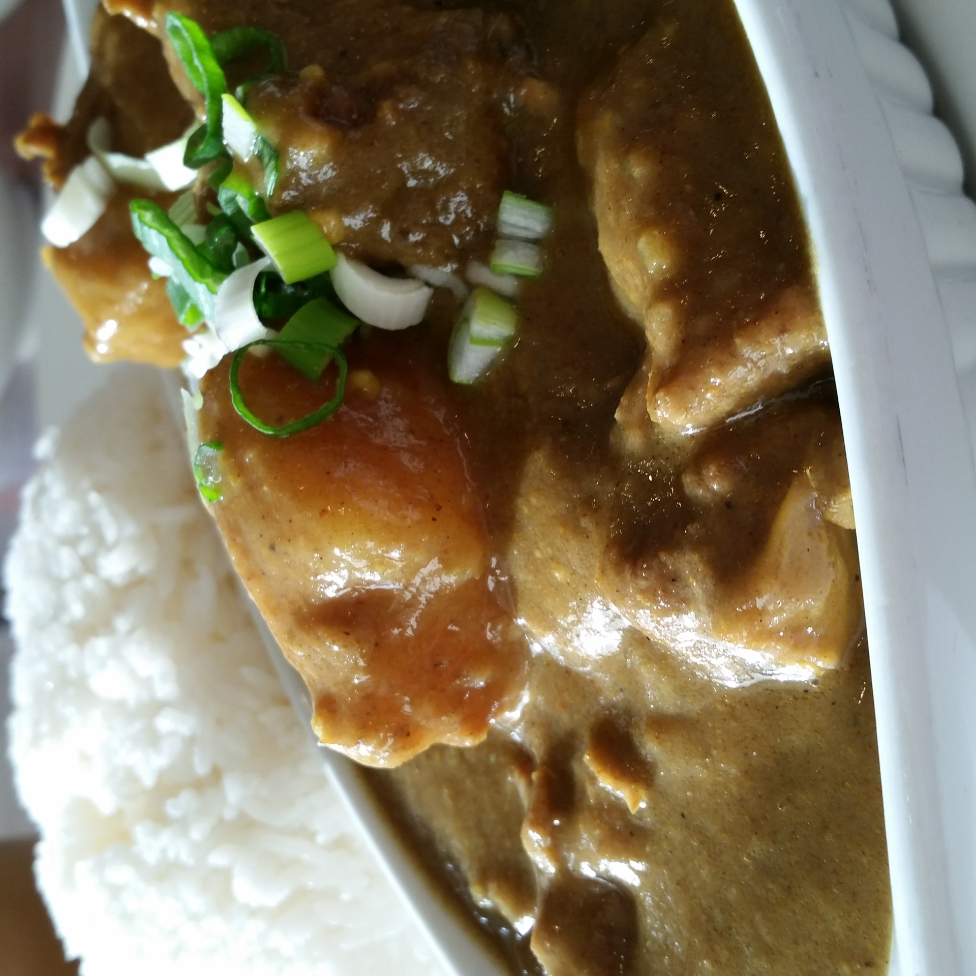 Lush Jamaican Curry Goat with Ginger Coconut Rice