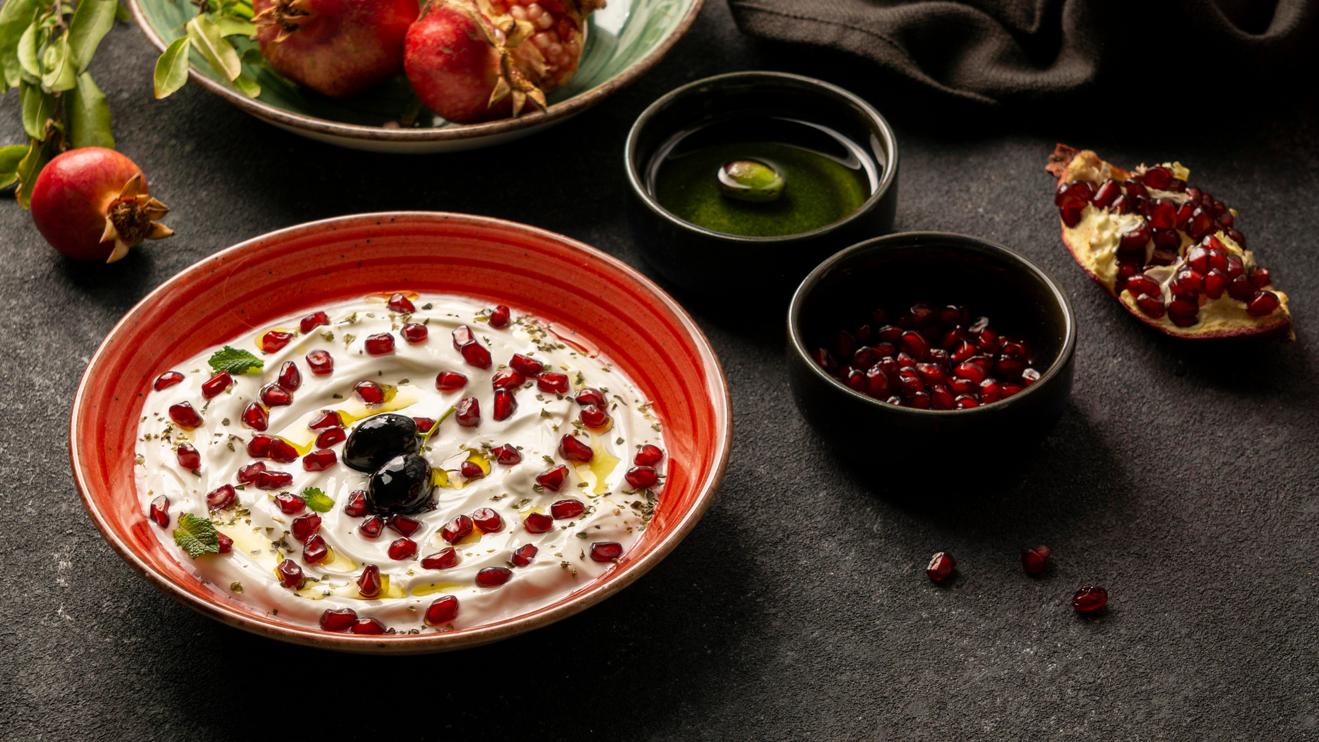 Radiant Indian Raita with Pomegranate Seeds and Mint Leaves