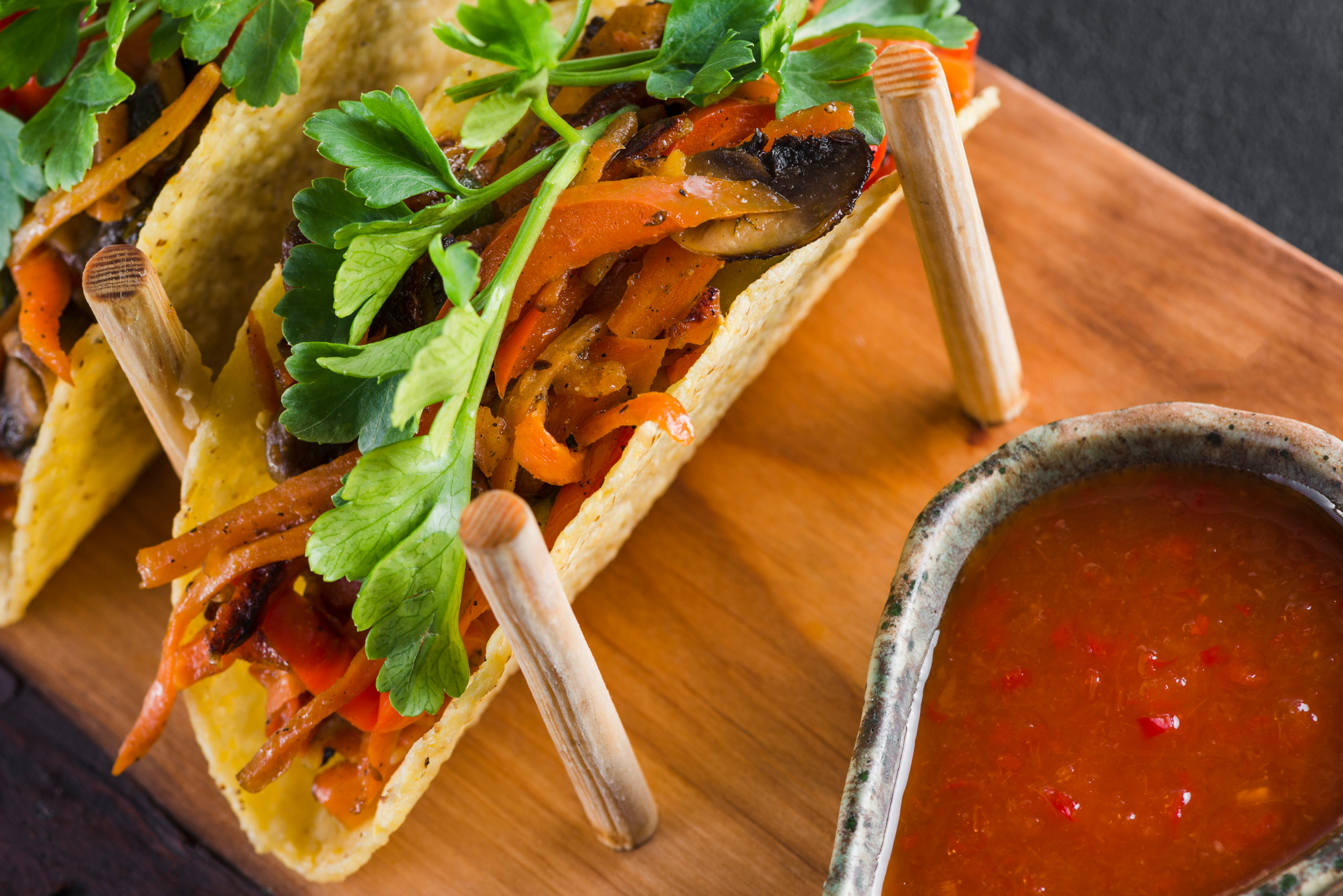 Rich Mexican Tinga Tostadas with Chipotle-Orange Salsa