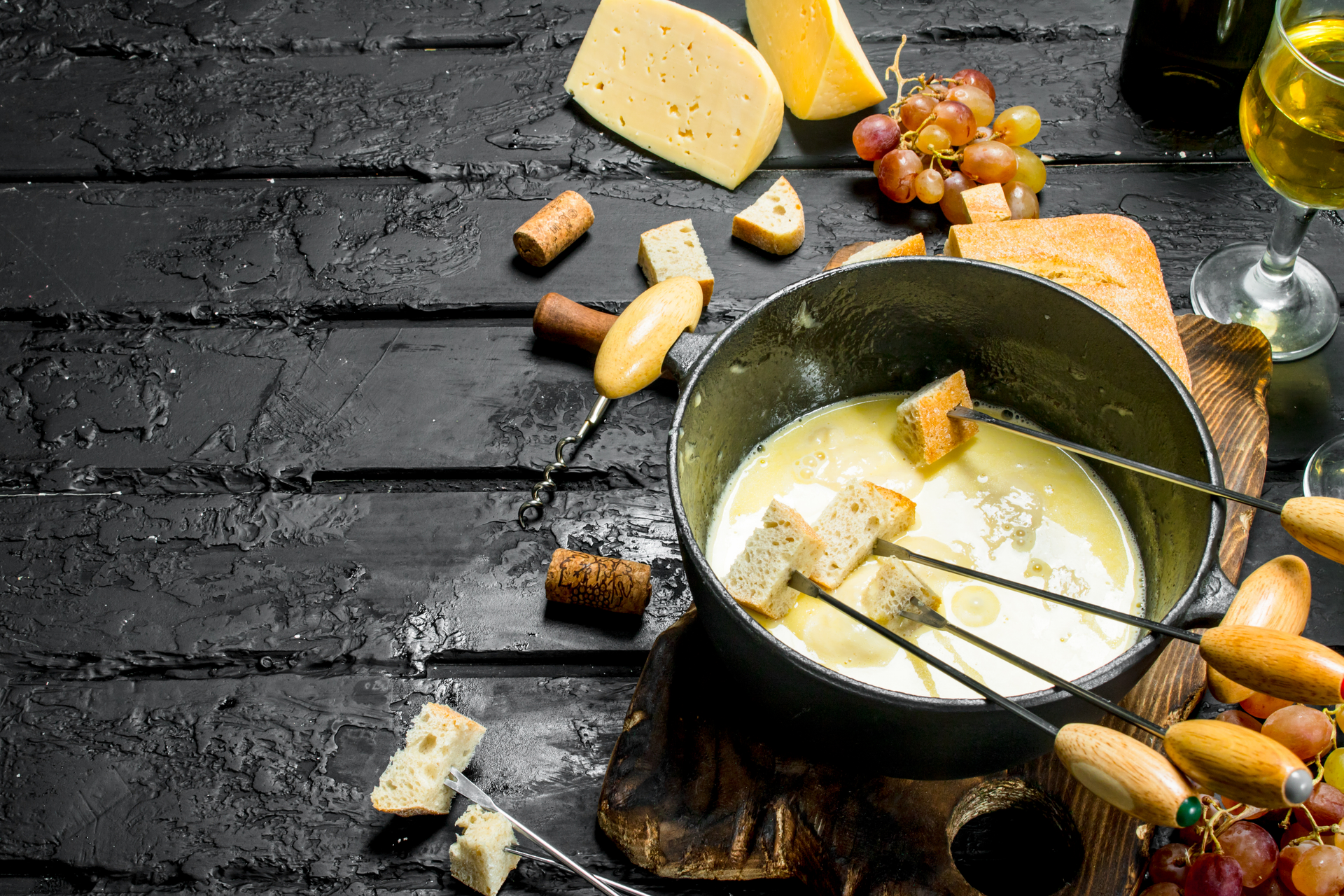 Rustic Alpine Raclette with Melted Cheese and Baby Potatoes