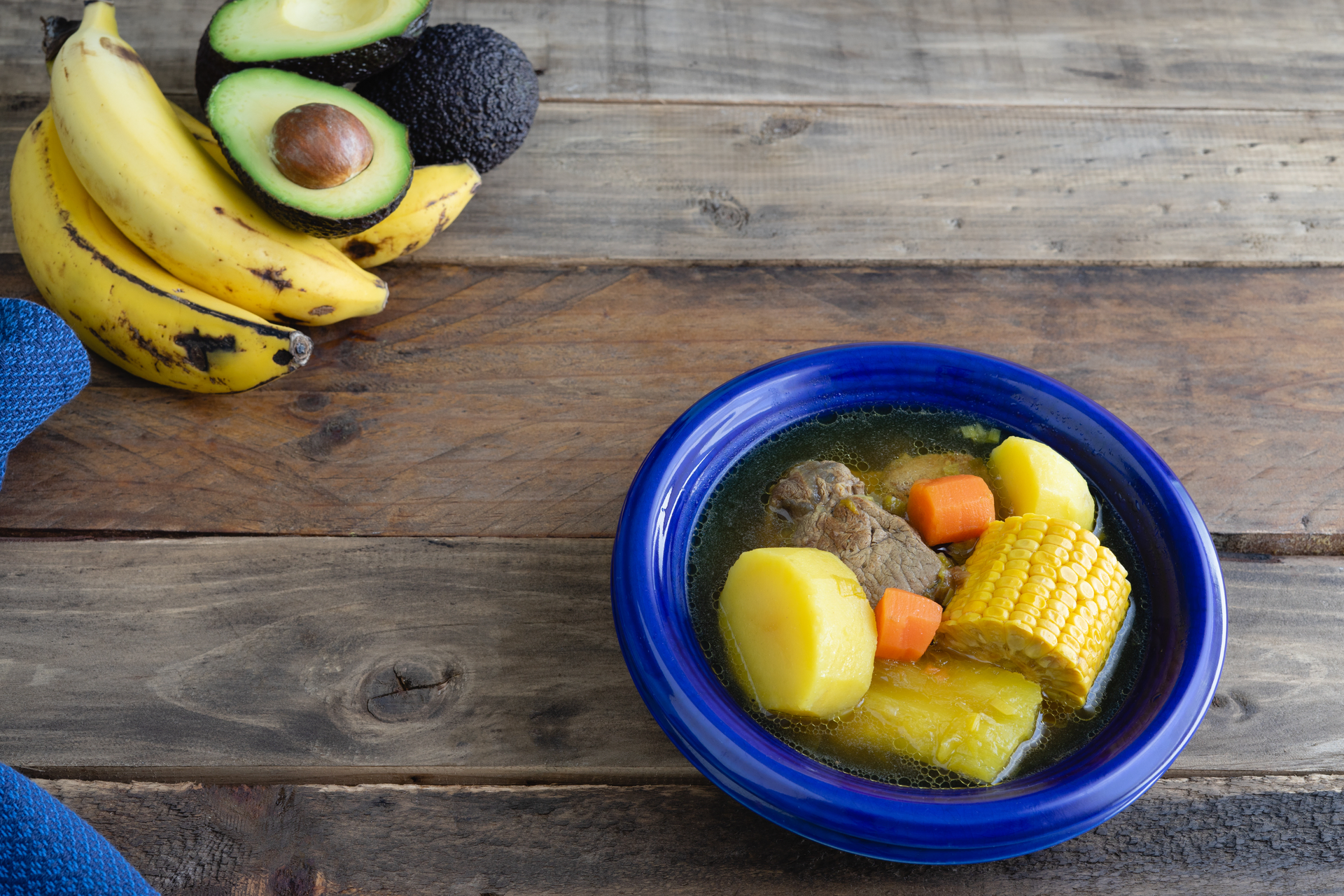 Rustic Colombian Bandeja Paisa with Plantains and Avocado