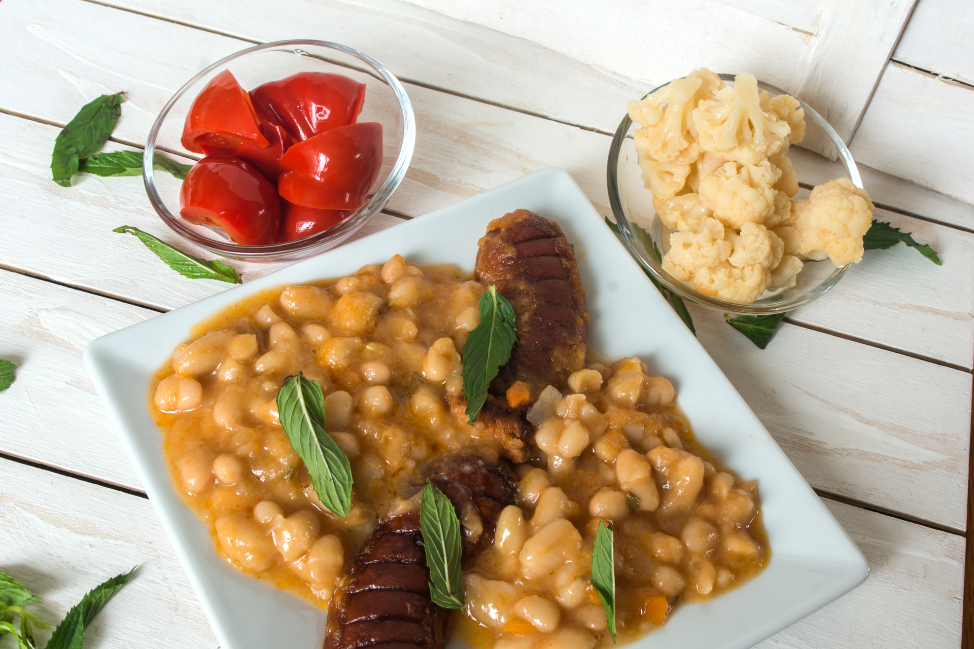 Rustic Spanish Chorizo Fabada with Cabbage and White Beans
