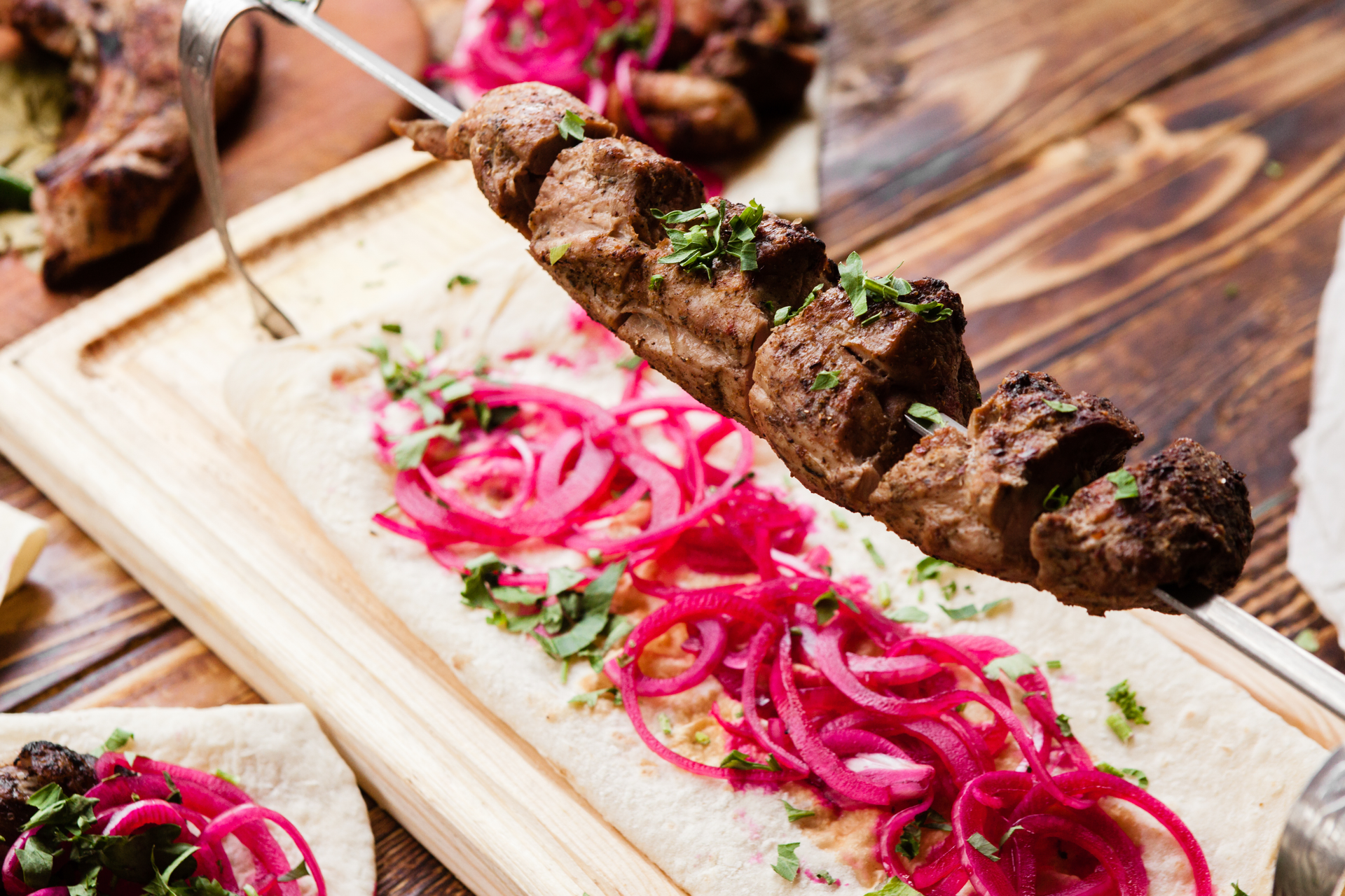 Saffron-Infused Persian Lamb Kebabs with Sumac Onions