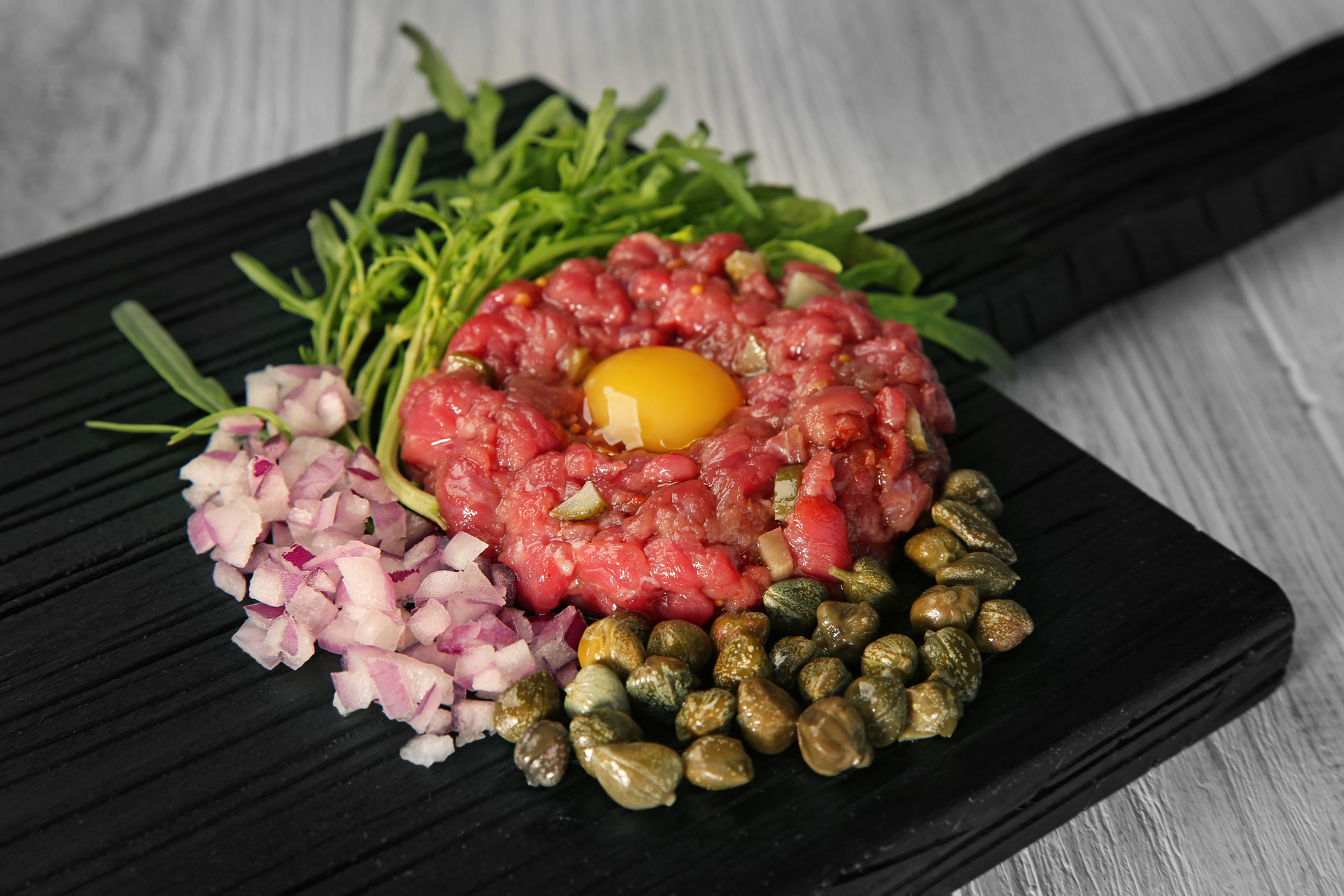 Sichuan Peppered Beef Tartare with Pickled Radish Shavings
