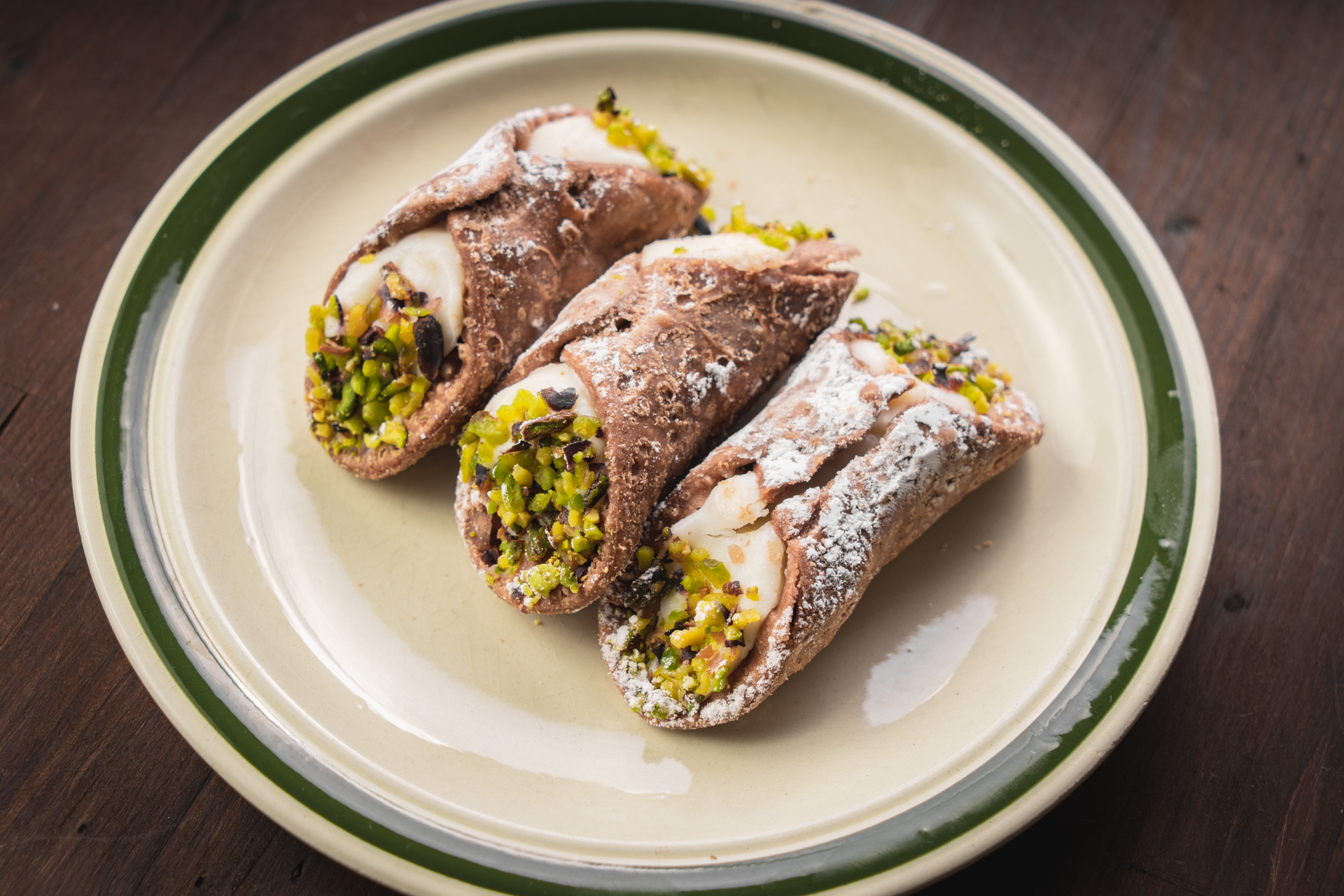 Sicilian Cannoli with Pistachio Ricotta Filling and Chocolate Drizzle