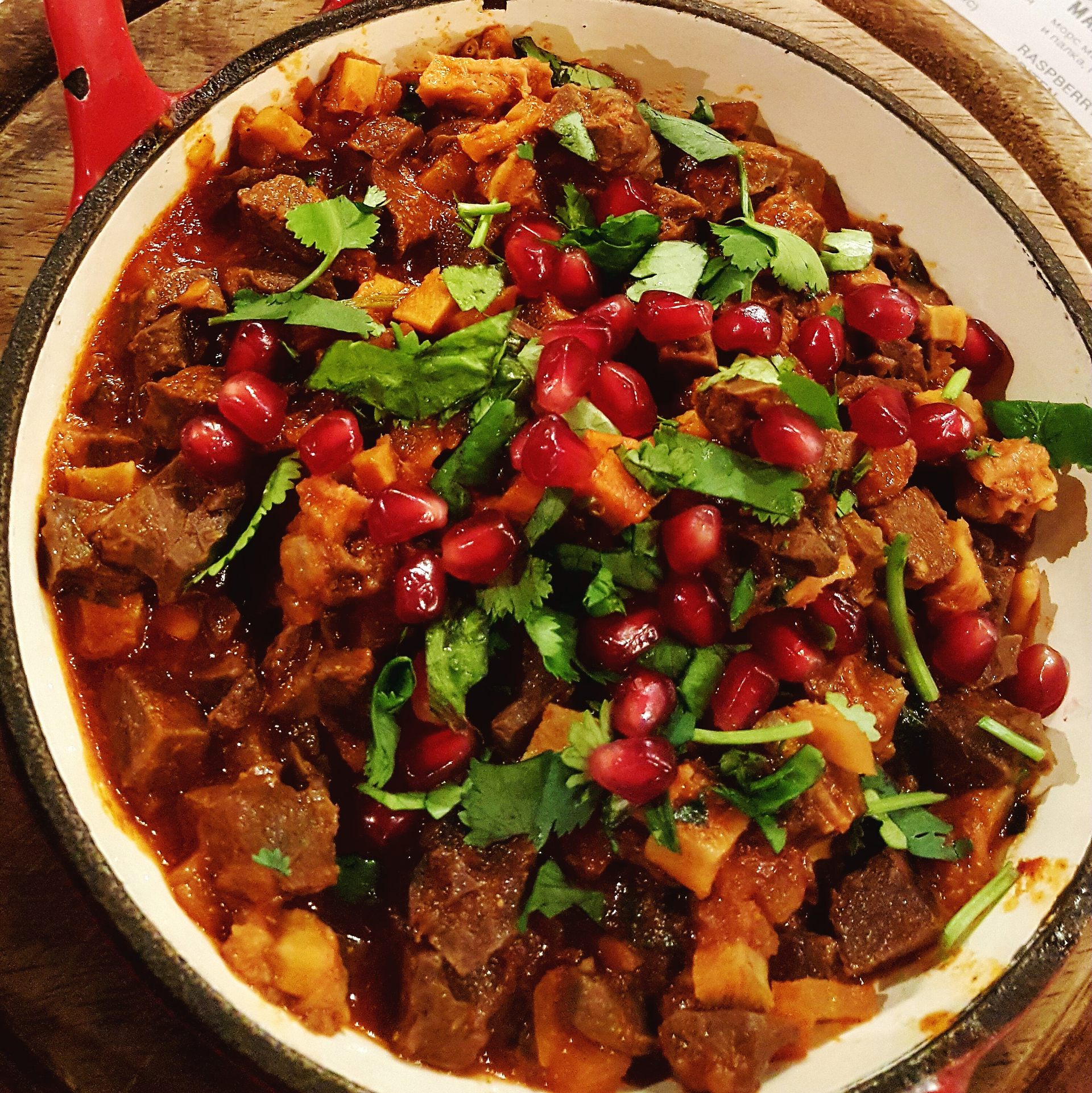 Spicy Caribbean Goat Pepperpot with Cassareep and Sorrel