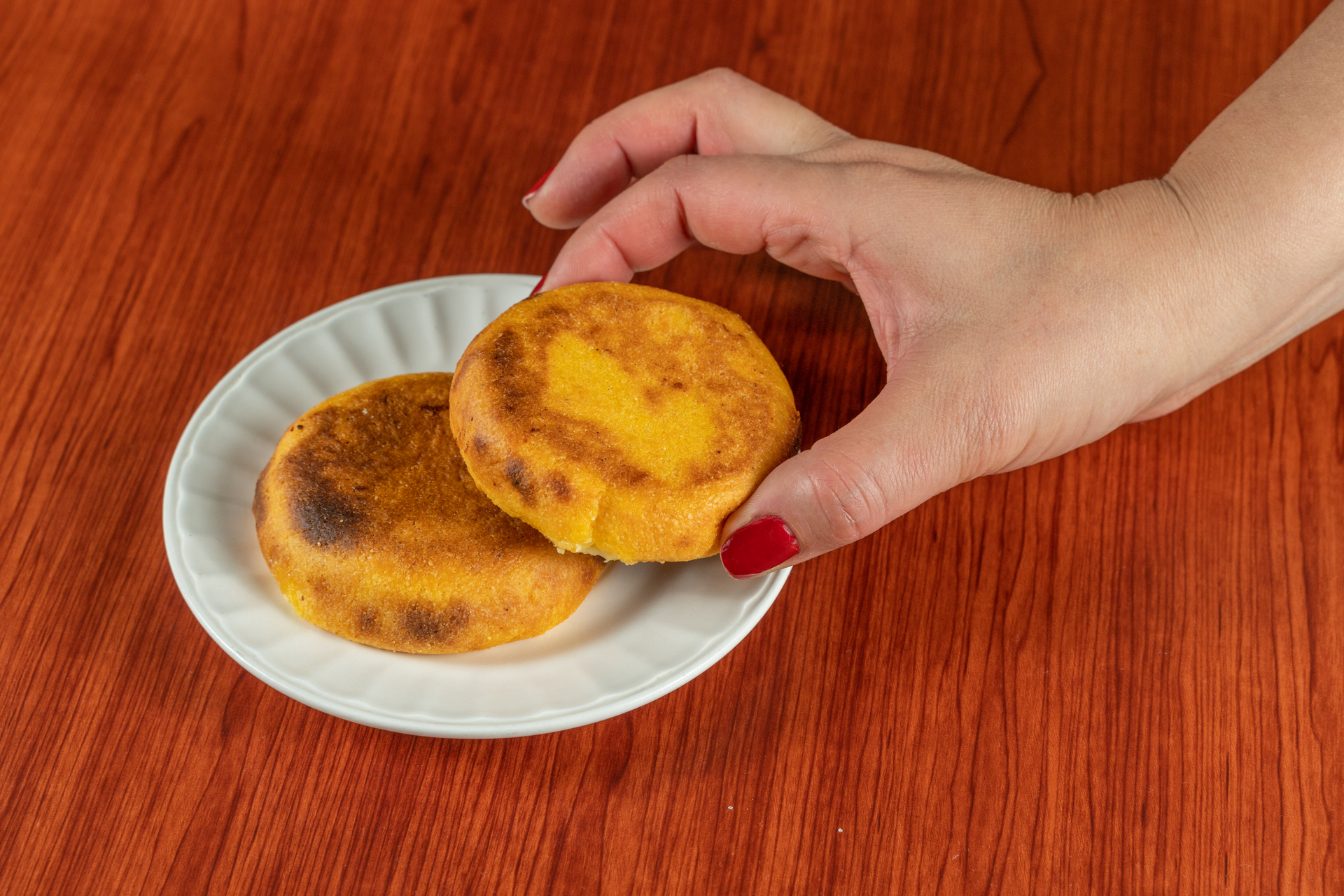 Spicy Colombian Chunchullo with Arepas