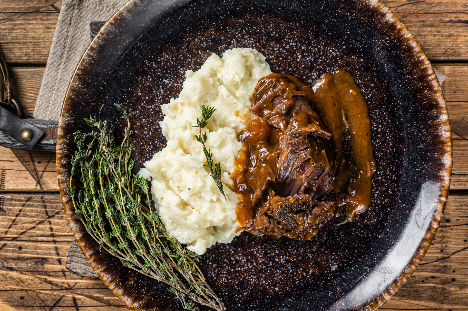Tender Guinness Beef Stew with Caramelized Shallots on Mashed Potatoes