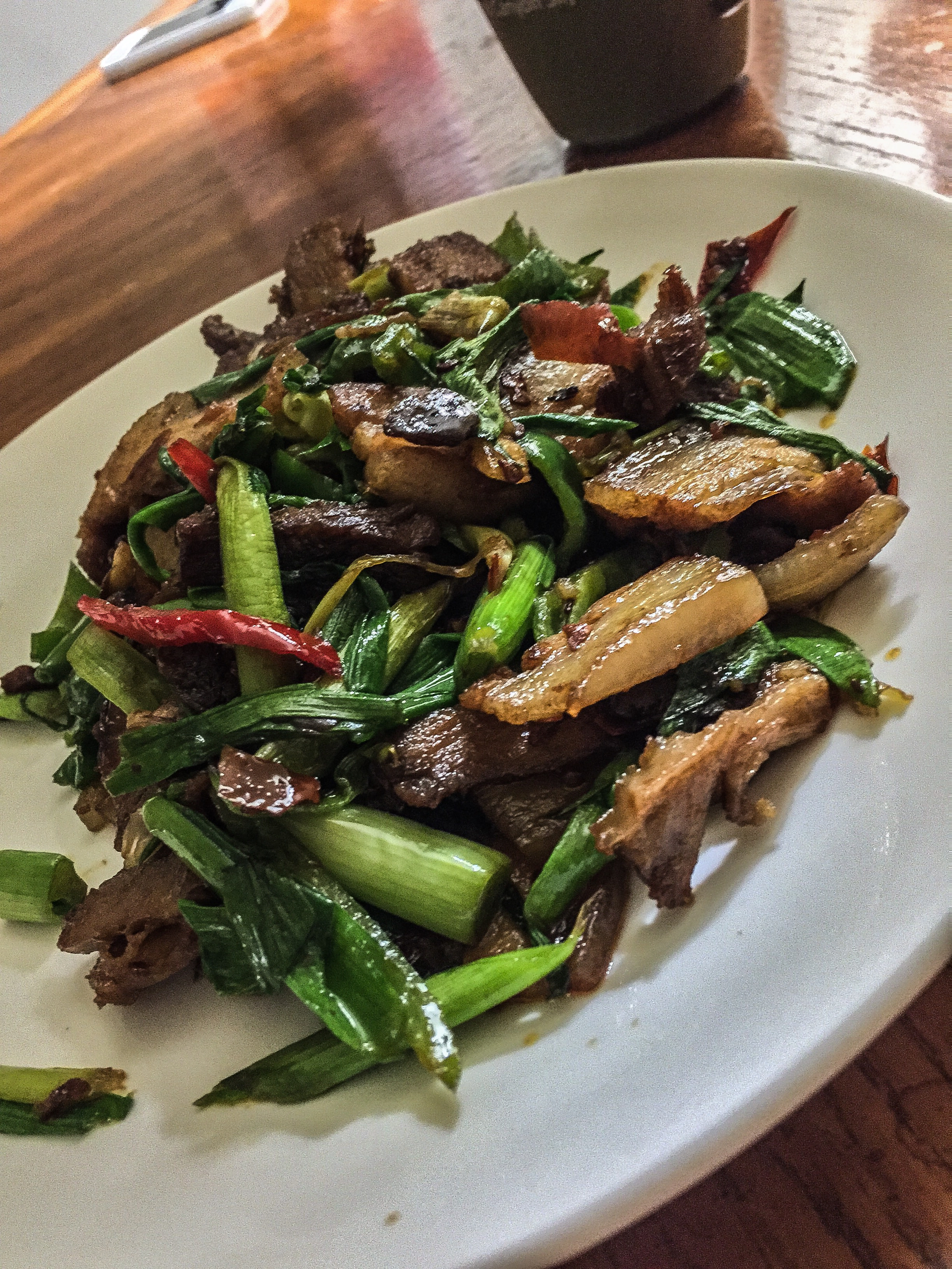Tender Szechuan Peppercorn Beef Stir-Fry with Garlic Shoots