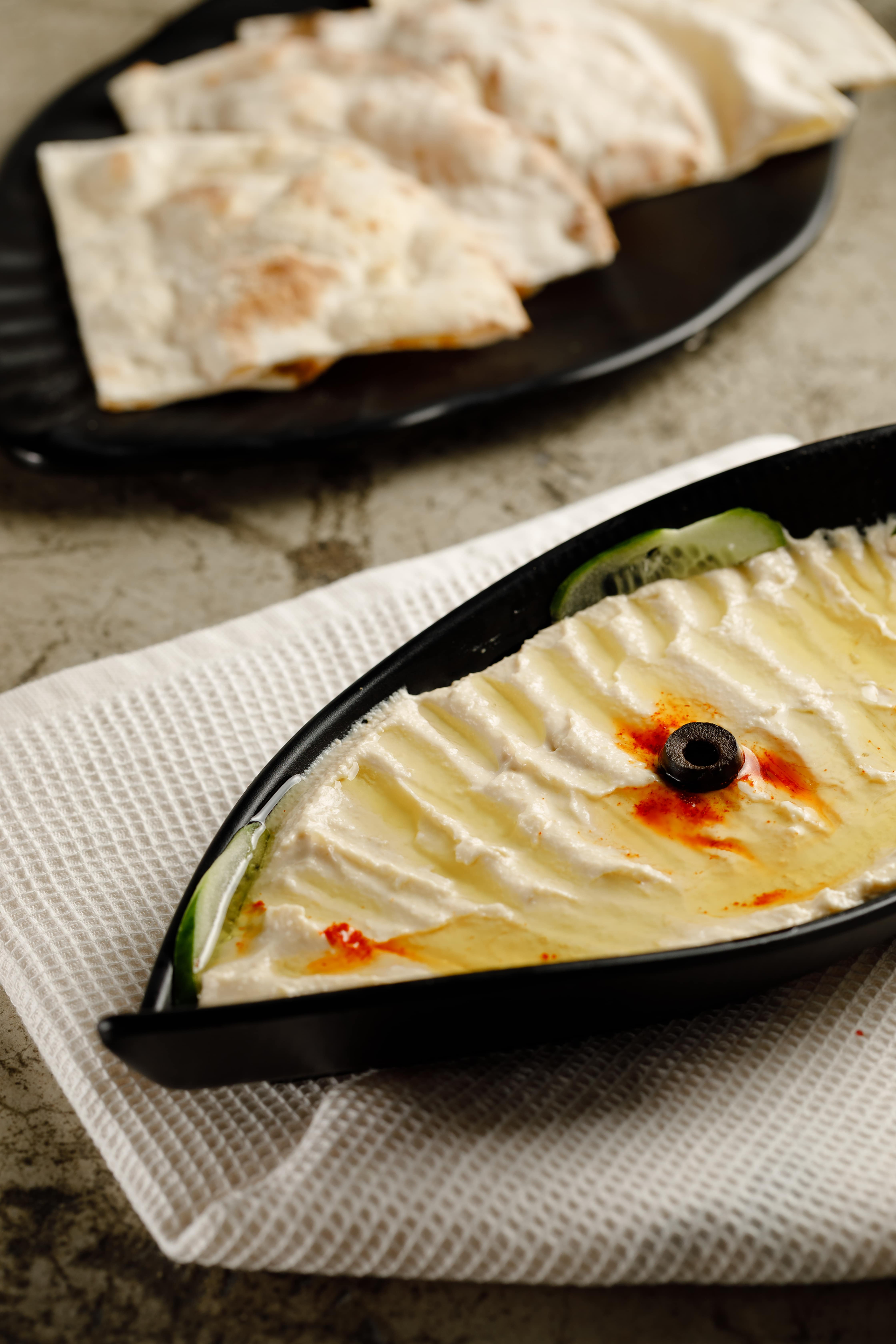 Velvety Peruvian Potato Humitas with Spicy Cream Sauce