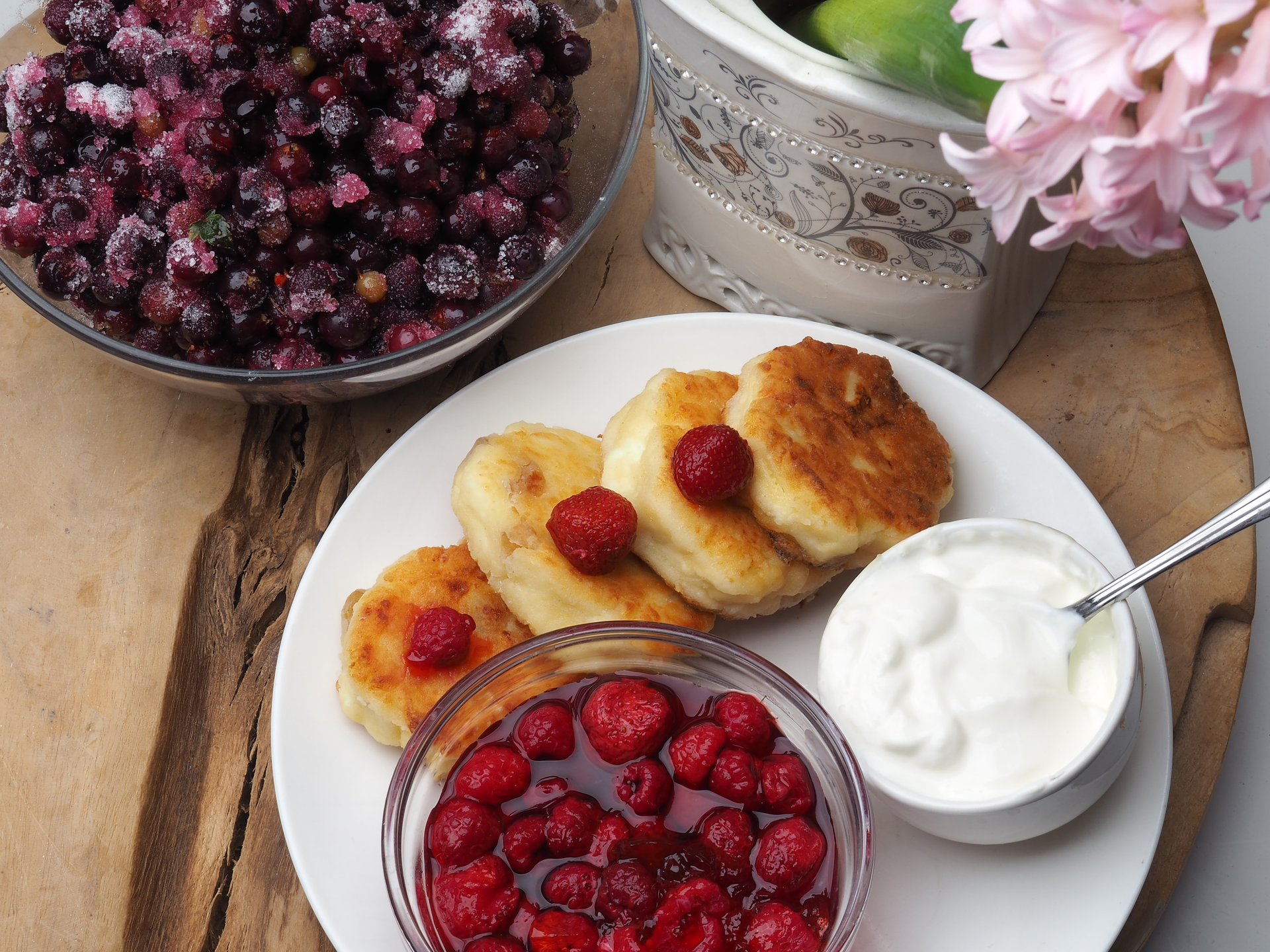 Velvety Russian Syrniki with Berry Compote and Sour Cream