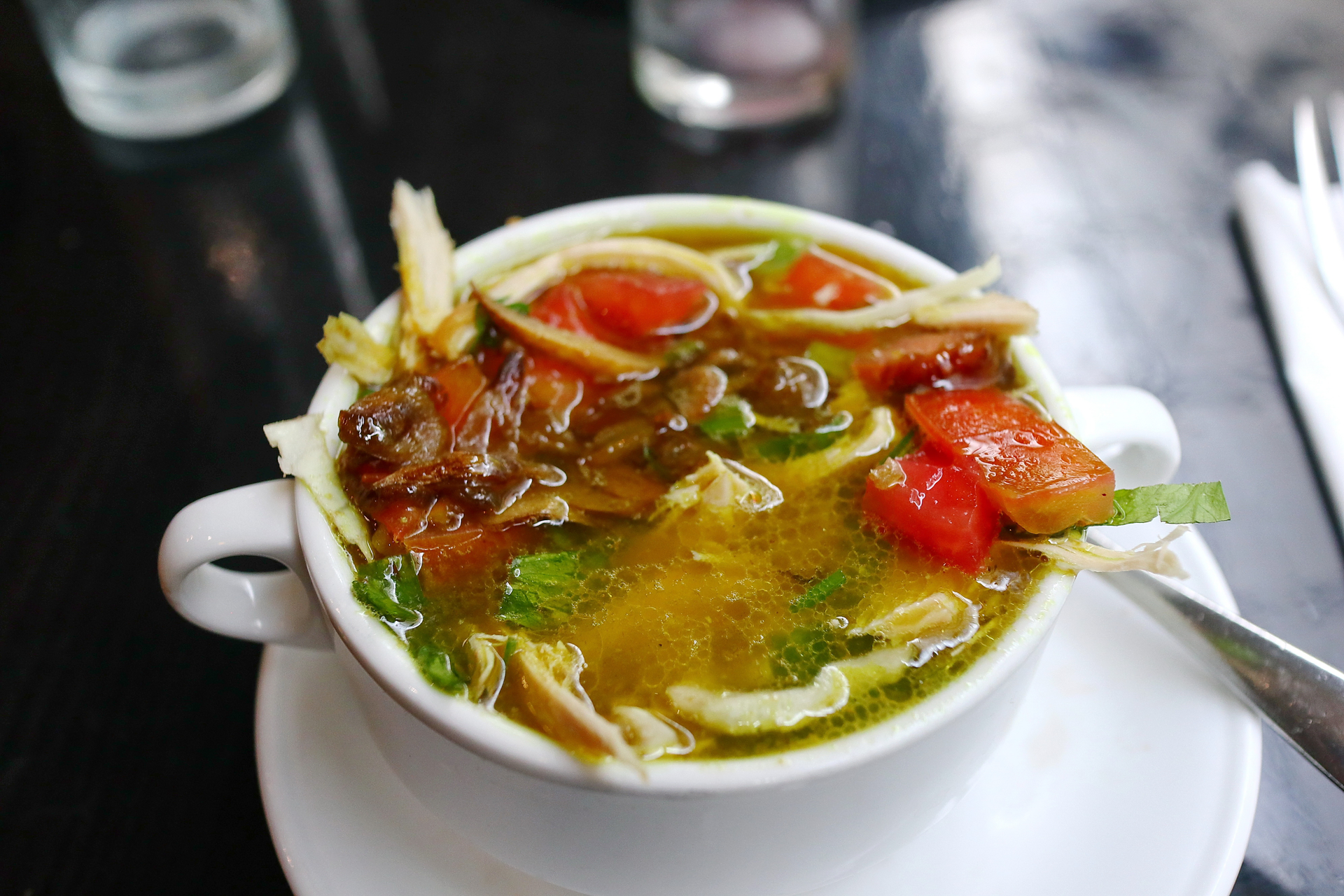 Zesty Haitian Bouillon with Fresh Vegetables and Spices